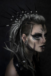 An elf-like woman with cyberpunk styling